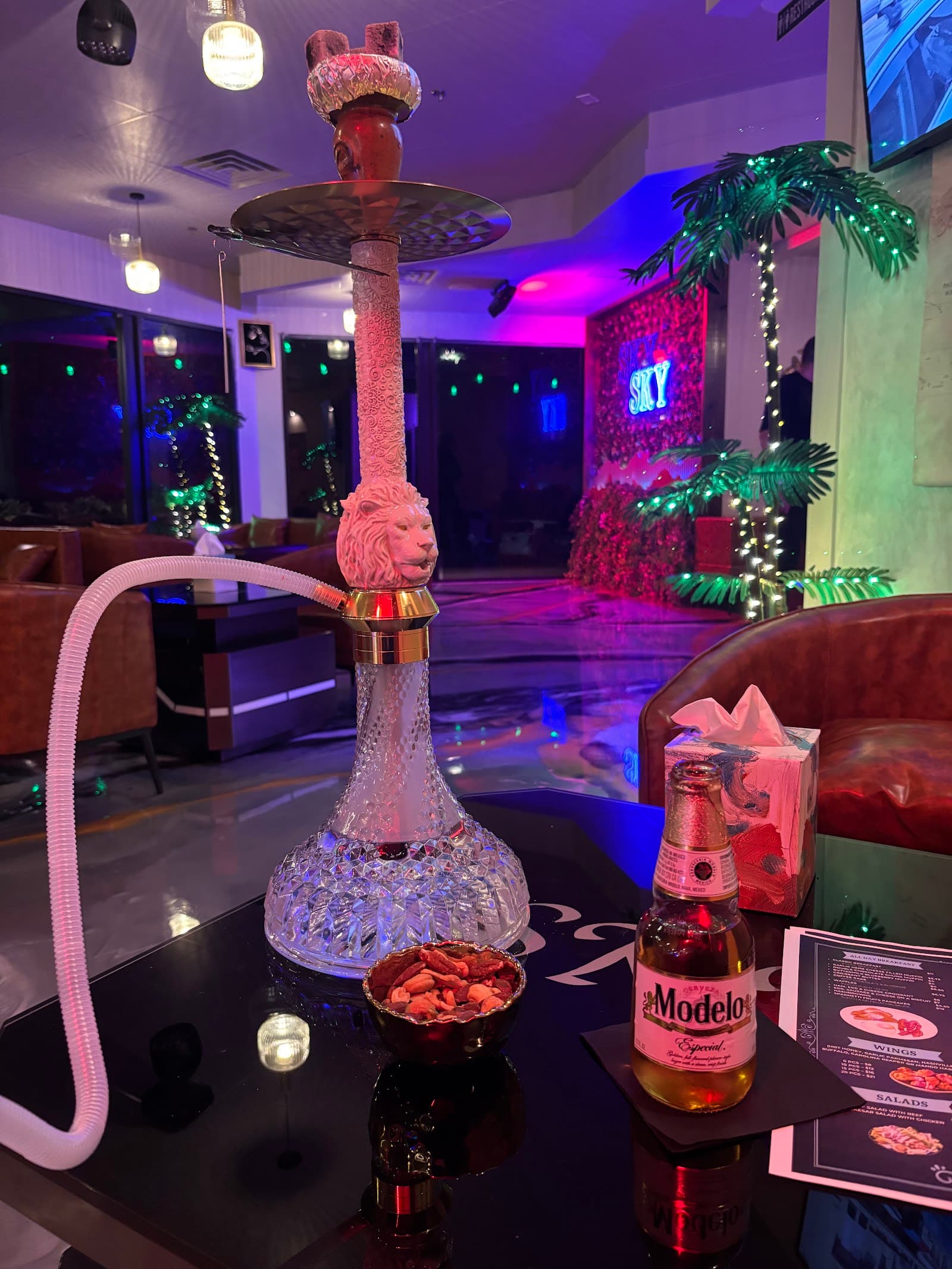 Lion-head crystal hookah under neon light